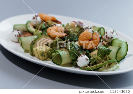 Gourmet Shrimp and Zucchini Ribbon Salad with Fresh Greens and Goat Cheese Garnish Gourmet Shrimp and Zucchini Ribbon Salad with Fresh Greens and Goat Cheese Garnish 118343620