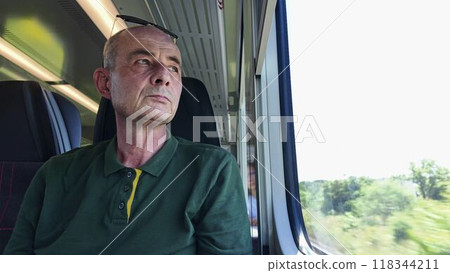 A man on a train. Older man commutes to work. Concept of daily routine of commute to work 118344211