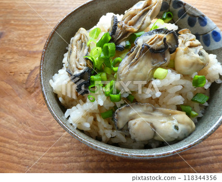 A photo of oyster rice made with plump shucked oysters A photo of oyster rice made with plump shucked oysters 118344356