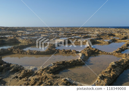 Salt pans on the coast of Gozo 118349008