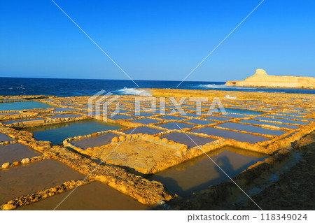 Salt pans on the coast of Gozo 118349024