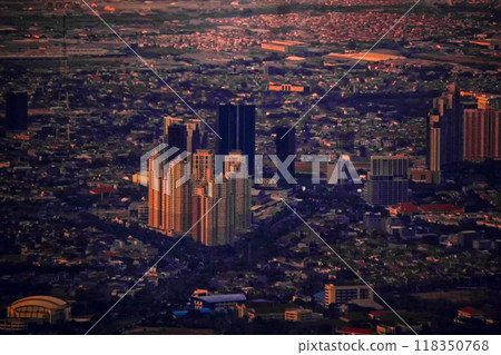 Aerial view of Surabaya skyline at sunset. Aerial view of Surabaya skyline at sunset. 118350768