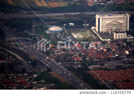 Aerial view of Surabaya, showcasing a sprawling urban landscape. Aerial view of Surabaya, showcasing a sprawling urban landscape. 118350770