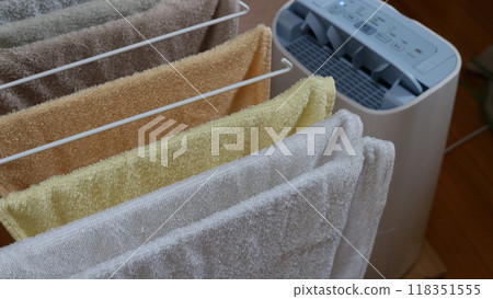 Dry clean, washed towels indoors in the dryer Dry clean, washed towels indoors in the dryer 118351555