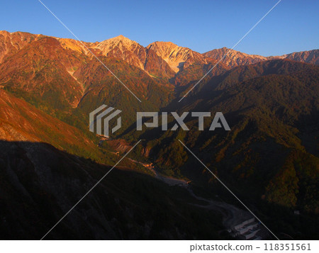 Morning glow of the Hakuba Sanzan mountains and Minamimata erosion control dam Morning glow of the Hakuba Sanzan mountains and Minamimata erosion control dam 118351561
