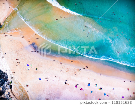 Top view waves crashing on sandy shore, Beach sea space nature background 118351628