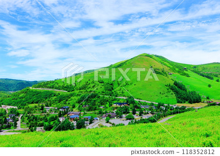 Kurumayama, the Southern Alps and the Yashimagahara Marshland from Kirigamine Plateau in July. Nature of Shinshu. Scenery of Shinshu. Kurumayama, the Southern Alps and the Yashimagahara Marshland from Kirigamine Plateau in July. Nature of Shinshu. Scenery of Shinshu. 118352812