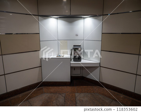 Tokyo cityscape: Digital public telephones installed in an underground passageway in the city center Tokyo cityscape: Digital public telephones installed in an underground passageway in the city center 118353602