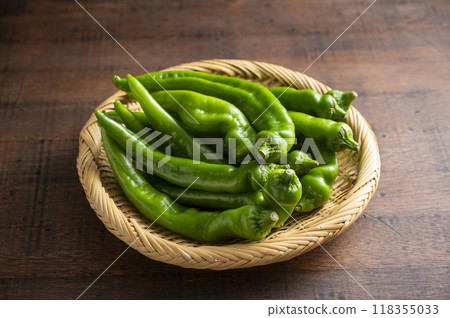 Manganji peppers served in a colander 118355033