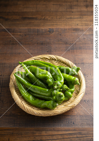 Manganji peppers served in a colander Manganji peppers served in a colander 118355034