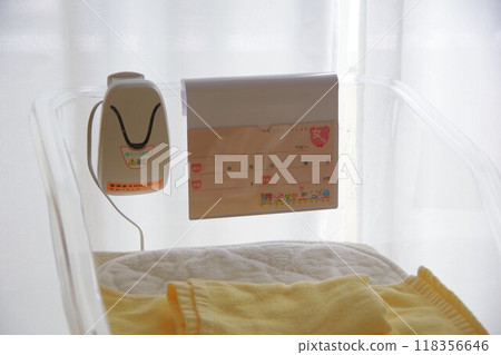 A cot for newborn babies to sleep on A cot for newborn babies to sleep on 118356646