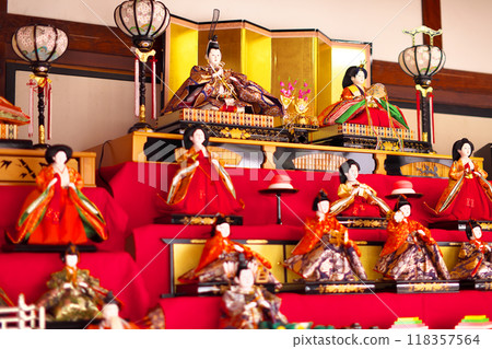 Old Emperor and Empress dolls displayed on a stage during Hinamatsuri Old Emperor and Empress dolls displayed on a stage during Hinamatsuri 118357564