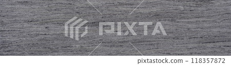 Gentle waves of dove grey and charcoal create a serene pattern on this driftwood veneer surface Gentle waves of dove grey and charcoal create a serene pattern on this driftwood veneer surface 118357872