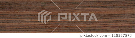 Cascading waves of caramel and coffee dance across the robust rosewood veneer's surface Cascading waves of caramel and coffee dance across the robust rosewood veneer's surface 118357873