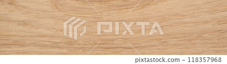 Rustic European oak veneer with a distinct knot and swirling grain patterns 118357968