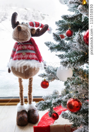Figurine of cute Christmas Reindeer and pine tree Figurine of cute Christmas Reindeer and pine tree 118358930