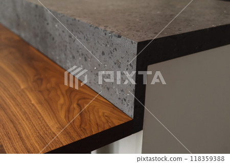 Closeup detail shot of gray terrazzo kitchen countertop with black marble 118359388