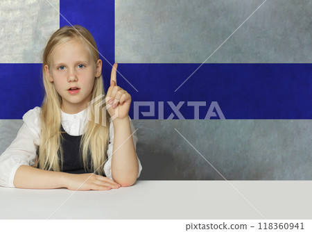 Pretty young child girl an Finnish flag background. Education in Finland  118360941