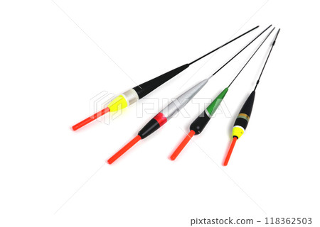 fishing floats of different shapes and colors on a white background close-up, copy space 118362503
