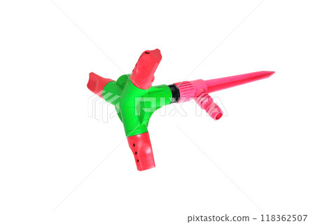 water sprinkler for watering lawns red-green color close-up white background 118362507