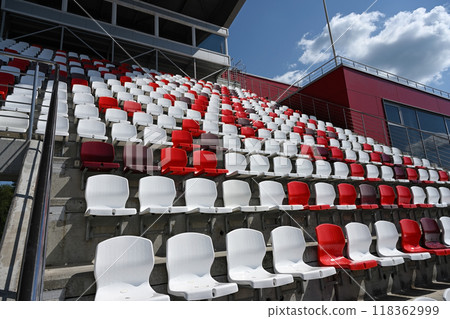 Red and white plastic seats in a sports stadium Red and white plastic seats in a sports stadium 118362999