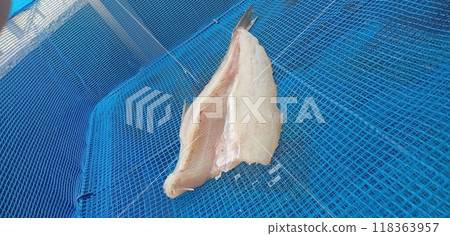 Making dried fish at home 118363957