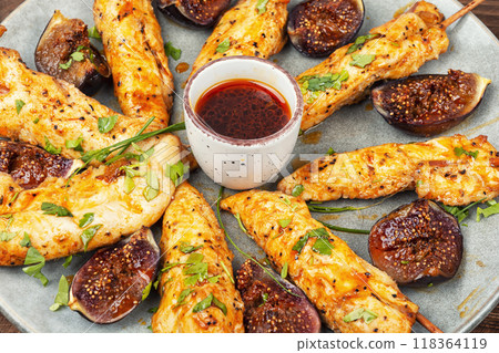 Homemade chicken skewers with figs chutney. 118364119