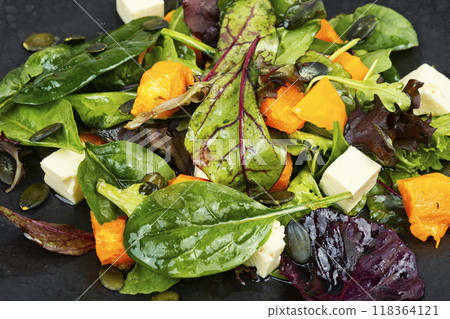 Plate of mixed green salad with Hokkaido pumpkin 118364121