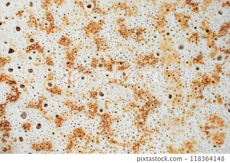 Pancake texture, baked pancake dough background. Close up. Pancake texture, baked pancake dough background. Close up. 118364148