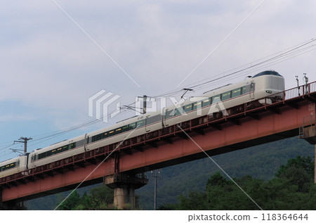 A view of the Shichimi River Bridge with a JR West 287 series express train crossing A view of the Shichimi River Bridge with a JR West 287 series express train crossing 118364644