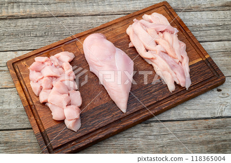 Raw chicken meat fillet ( breast ) Various of cutting in form slice and cube 118365004