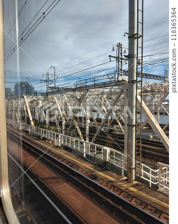 Trains running in Osaka city 118365364