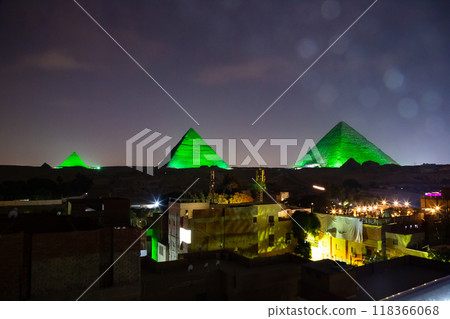 Great Pyramid complex enlighted at night, Giza, Egypt 118366068