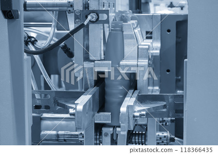 The blow mold machine operation in the light blue scene. The blow mold machine operation in the light blue scene. 118366435