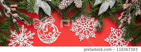 Red Christmas background with fir branches Red Christmas background with fir branches 118367383