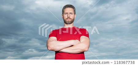 Grizzled man sky background. Serious man grizzle keeping arms crossed. Confident man in casual 118367738