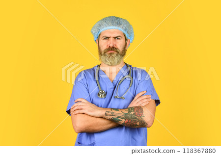 Health care. Doctor occupation. Medical insurance. Incubation period. Doctor ready to help. Diagnosis concept. Global health emergency. Man bearded doctor wear uniform cap. Hipster work at hospital Health care. Doctor occupation. Medical insurance. Incubation period. Doctor ready to help. Diagnosis concept. Global health emergency. Man bearded doctor wear uniform cap. Hipster work at hospital 118367880