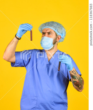 nurse man wear respirator mask hold blood test. symptoms of acute respiratory infection. new virus spreads from China. Pathogen leads to pneumonia. virus attacks people. epidemic health risk 118367883