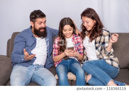 Got sms. Happy family read sms in smartphone. Texting and messaging via mobile phone 118368119