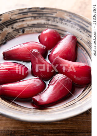 Delicious pickled radishes in red wine 118368671