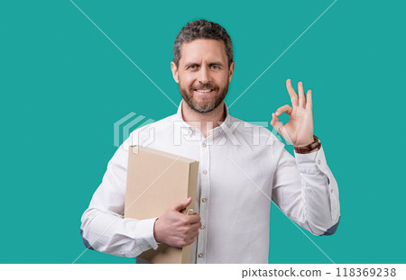 businessman freelancer show ok isolated on blue background. businessman freelancer 118369238