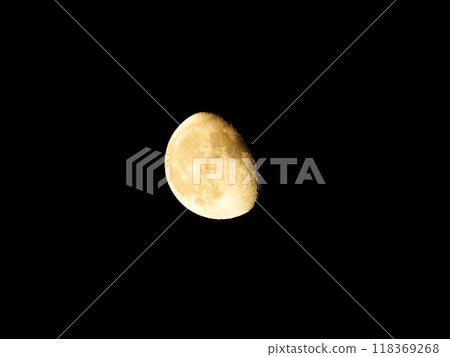 moon floating in the night sky 118369268