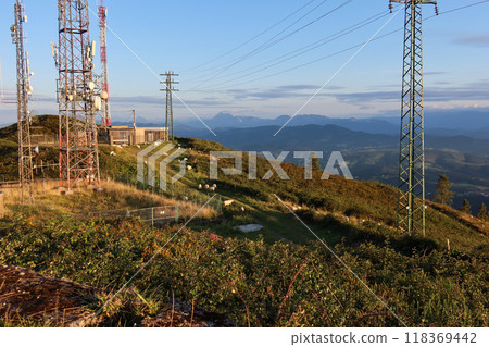 Sheep Grazing Under Communication Towers on Sollube Peak, Basque Country, Spain Sheep Grazing Under Communication Towers on Sollube Peak, Basque Country, Spain 118369442