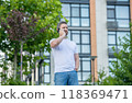 caucasian man call on phone outside. photo of man call on phone and talk. 118369471