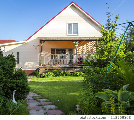 A blooming garden in the backyard A blooming garden in the backyard 118369508