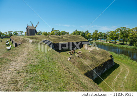 Wooden windmill at Kuressaare Castle in Estonia Wooden windmill at Kuressaare Castle in Estonia 118369535