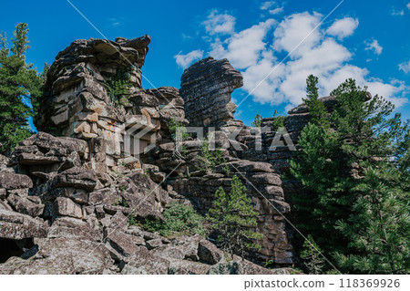Tourist attraction and Climbing training area. Syenite rocks igneous mountain formation. cooled layers of magma.  118369926