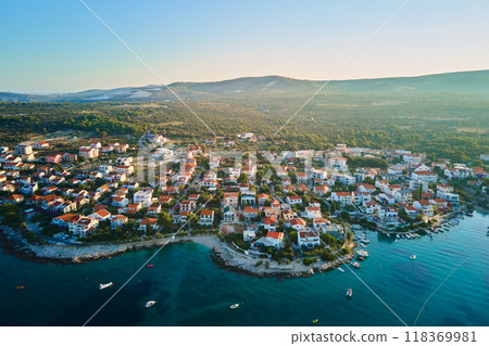 Aerial view of Adriatic sea coastline with coastal village and boats along shoreline. Panorama of tourist town Rogoznica in Croatia on Adriatic Sea. Summer travel concept Aerial view of Adriatic sea coastline with coastal village and boats along shoreline. Panorama of tourist town Rogoznica in Croatia on Adriatic Sea. Summer travel concept 118369981