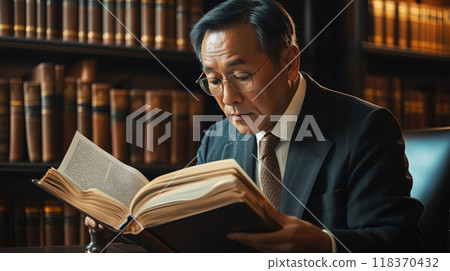 Seasoned Asian Lawyer in a Classic Library Setting 118370432