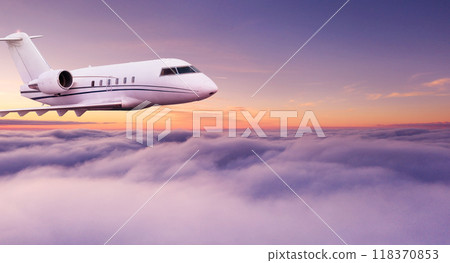 Passengers commercial airplane flying above clouds in sunset light. Concept of fast travel, holidays and business. Passengers commercial airplane flying above clouds in sunset light. Concept of fast travel, holidays and business. 118370853